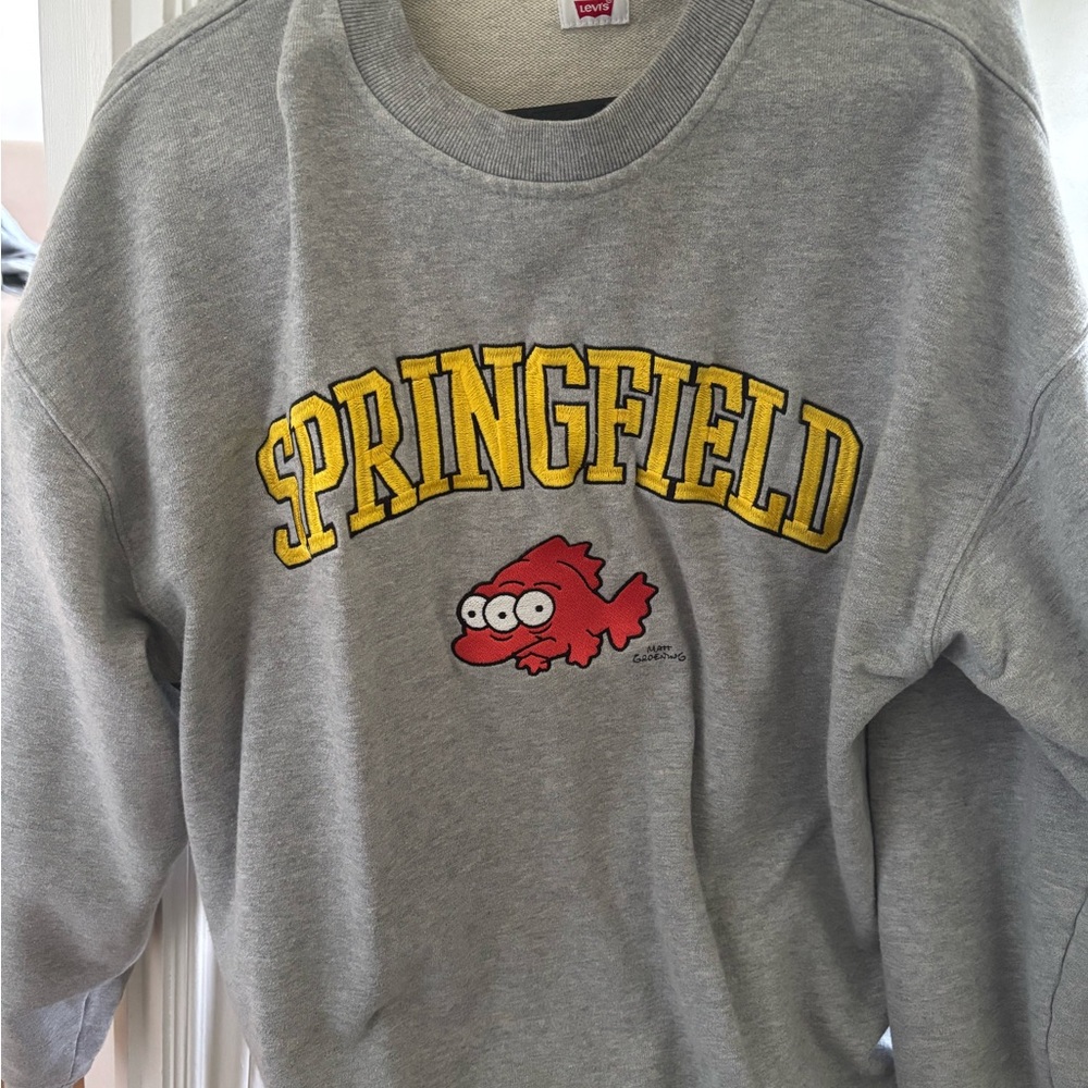 Levi Simpsons sweatshirt with fish cartoon